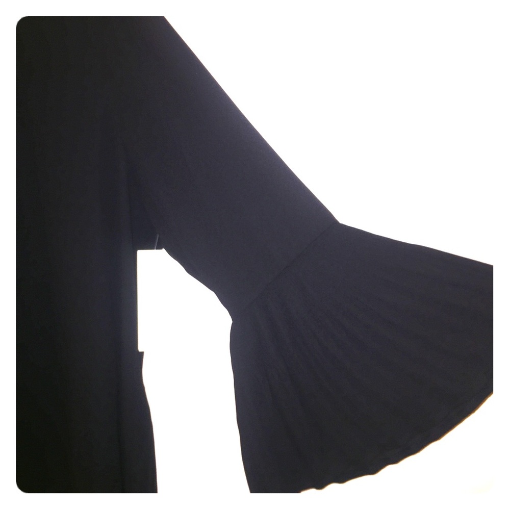 Bell Sleeves Featured on Black Blouse
